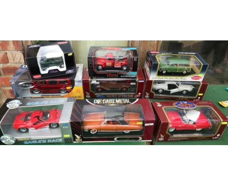 A collection of large diecast model cars 1:18 scale to include Kyosho Morris Mini Traveller, Kyosho Morris Mini Cooper 1275S,