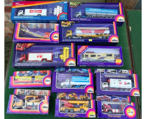 12 boxed diecast Siku trucks, crane and mobile home to include Nos. 2914 Kranwagon Mobile Crane, 2517 Volvo LKW, 2819 Feurweh