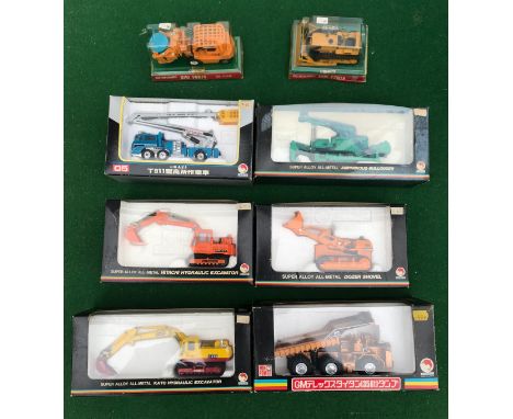 Lot containing 8 Shinsei diecast model vehicles including Kato Hydraulic Excavator, Dozer Shovel, Hitachi Hydraulic Excavator