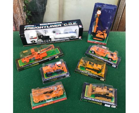 Shinsei diecast vehicle collection to include No. 4125 Hydraulic Motor Scraper, D65S Komatsu Earthmover, 4132 Tractor ripper,