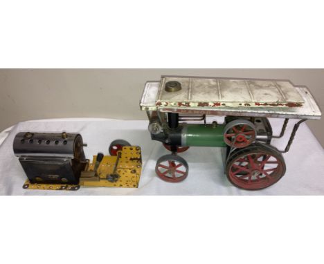 A Meccano live steam stationary engine and a Mamod Steam Tractor.