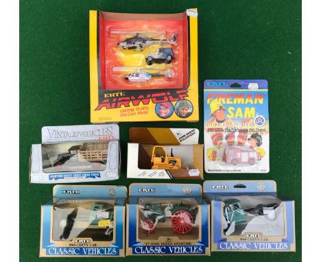 A collection of Ertl Diecast vehicles to include Fireman Sam Jupiter Fire Engine, John Deer Bulldozer, 2625 1960 Chevvy Cab, 