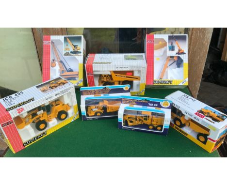 A collection of boxed Joal diecast metal vehicles including JCB 712, 217 Leveller, 222 Tractor Cat, 242 JCB 435, 242 Euclid, 