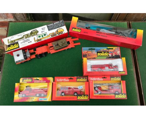 Solido diecast vehicles to include 2 x Berliet T12 transport trucks and 4 x various fire engine models.Condition ReportVery g