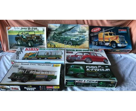 Seven assorted makers model kits including Monogram 2500 Peterbilt 359 Conventional, Dragon 3520 SS1c SCUD B, Mitsuwa 301, Fu