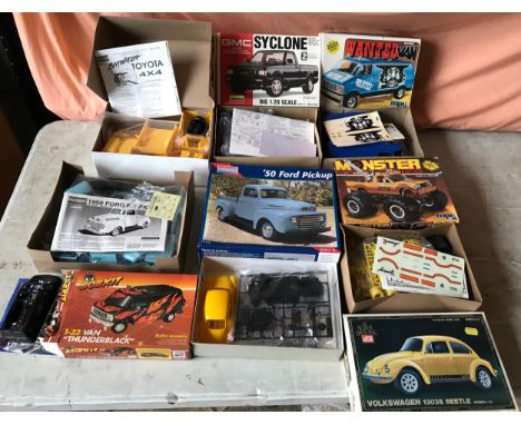 Model kit vehicles selection. 1-20 scale, various makes, Lindberg Baywatch Toyota 4x4, GMC Syclone Monogram 50 Ford pickup, M