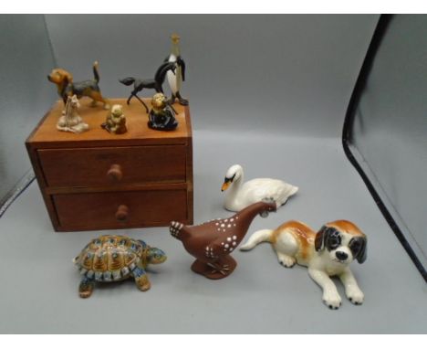 Beswick swan, Goebel chicken and dog and some wade and other animals in wooden box