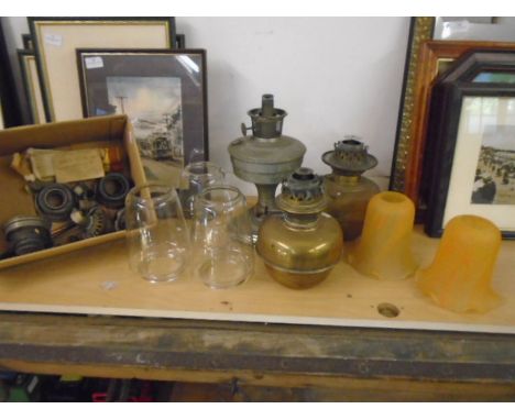 3 oil lamps, glass shades and box of oil lamp/ tilley lamp accessories
