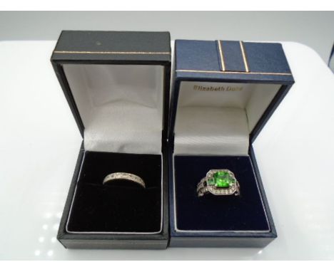 2 Costume jewellery rings in boxes size - K 