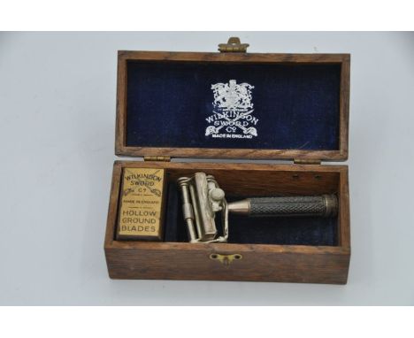 Vintage Wilkinson Sword with hollow ground blades in original wooden box  