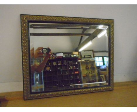 gilt and black framed bevelled mirror 58x48cm