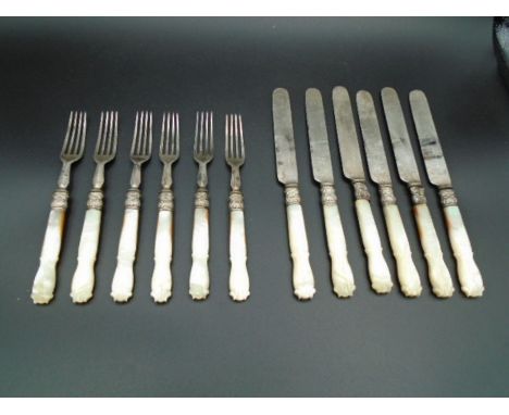 A set of six fruit knives and forks with Mother of Pearl handles  