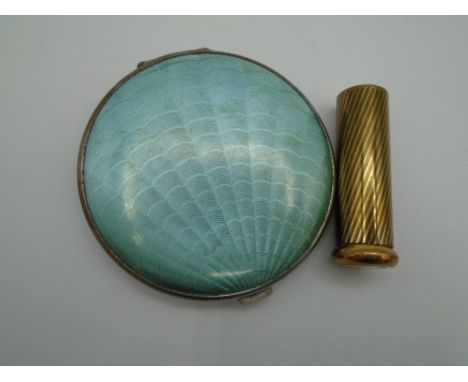 A vintage compact  with mirror marked 'Chomium finish' and a vintage Dorothy Gray lipstick case  - marked  'Siena gold'  