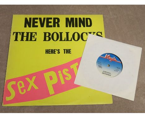 Sex Pistols Never Mind the Bollocks Original UK LP + Submission 45Mega rare first issue of Never mind the bollocks here's the