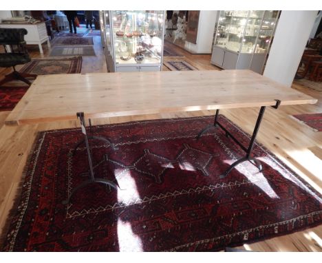 Industrial trestle kitchen table, pine plank top, iron studded arch supports, 207 x 87cm.