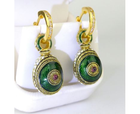Pair of green enamel decorative earrings of Persian influence.