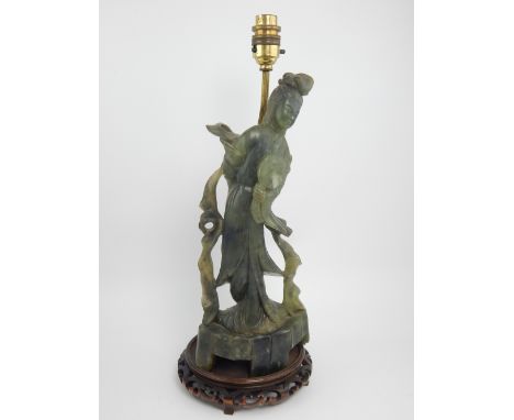 Chinese spinach jadeite lamp modelled as Quanyin on carved hardwood stand 33 cm H 
