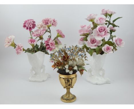 Carl Faberge, 'Russian Imperial Bouquet', 17cm h., and two ceramic floral bouquets. (3)