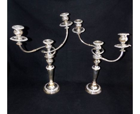 Pair of plated three light candlebras, 47cm h. (2)