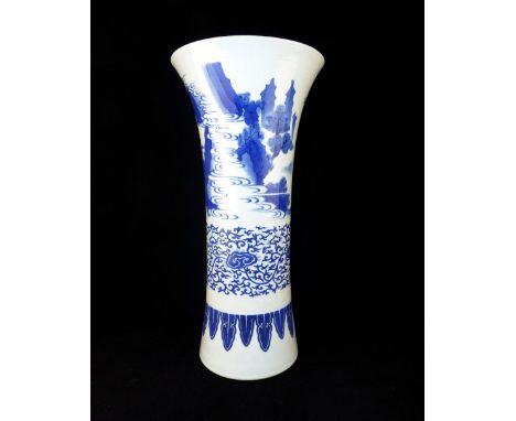 Chinese blue and white porcelain vase, tapering form, top edge with a continous design of figures in landscape above scroll a