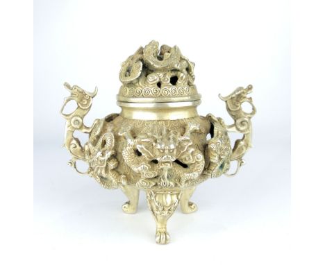 Chinese cast white metal Koro and cover, twin dragon handled on three scroll feet 14 cm H 