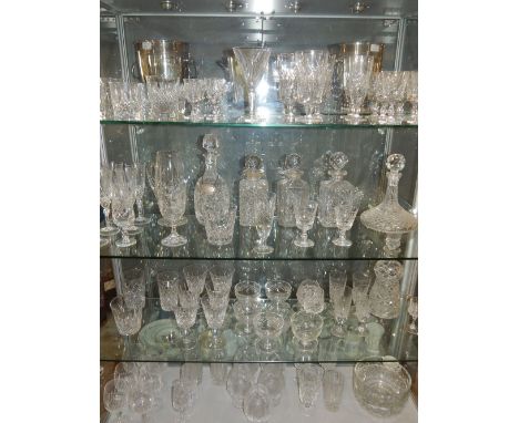 Quantity of assorted cut glass drinking glasses including whiskey tumblers, white and red wines, thistle shaped decanter and 