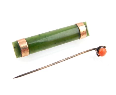 Yellow metal a green jade brooch and yellow metal and coral stick pin