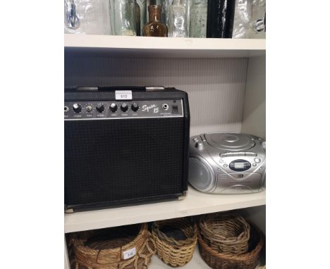Squire amplifier together with cd player. 