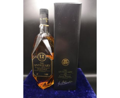 Bottle 12 year old The antiquary the finest scotch whisky 43o 1 litre. Full and sealed with box. 
