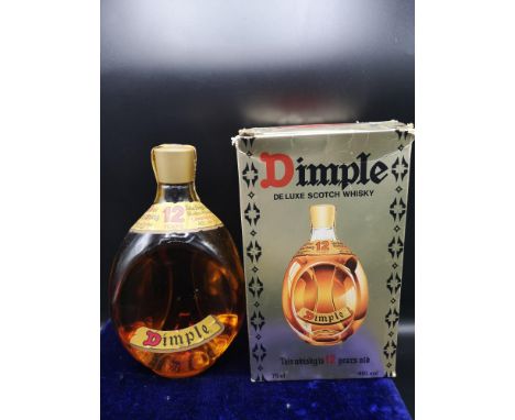 Old 60's bottle of 12 year old de luxe scotch whisky with vintage presentation box. 75cl. 