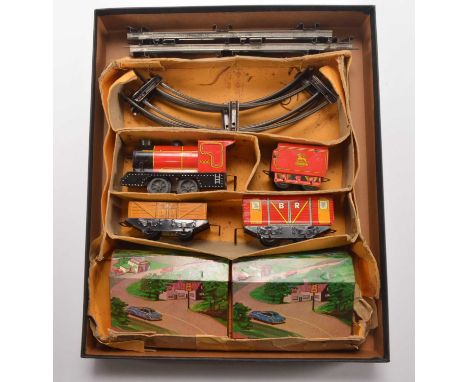 Brimtoy 0 Gauge clockwork BR Train Set, comprising red 7000 0-4-0 Locomotive and Tender, brown open wagon, red Van, two piece