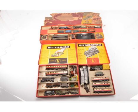 Three Trix 00 Gauge Train Sets some made up with additional stock (3), Set 1, comprising original LNER black 2394 0-4-0 Loco 