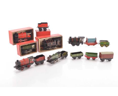 Hornby 0 Gauge M Series and Type 101 Clockwork Engines some with tenders and Rolling stock  and Brimtoy Engine and other make