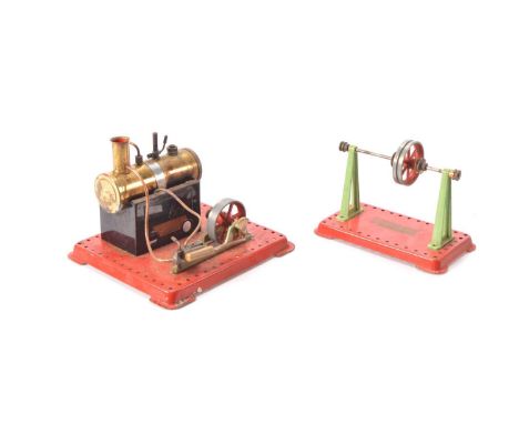 Mamod SE1 horizontal Steam Engine and Line shaft (2) Mamod stationary engine with single cylinder and fly wheel on red base, 