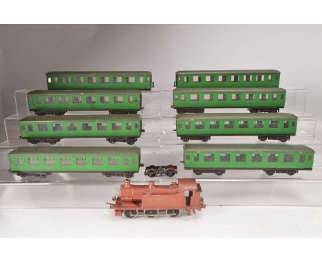 Crudely built 0 Gauge scratchbuilt 0-6-0 Tank Engine with Lima Chassis and eight SR heavily modified Lima SR green Coaches (9