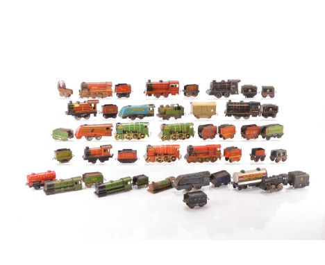 Mettoy/ Wells-Brimtoy/ Chad Valley 0 Gauge Locomotives & Rolling stock (20 plus), including 0-4-0 Loco & Tender BR black No.6