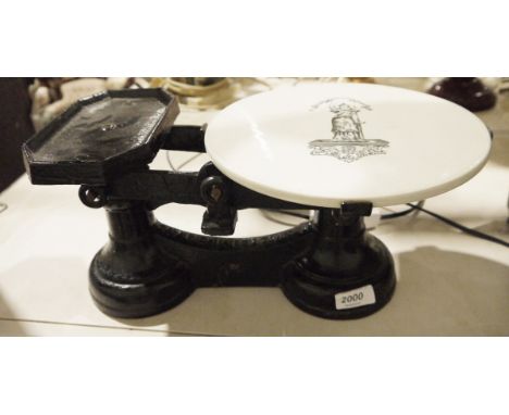 Antique cast iron scales&nbsp;with ceramic weighing plate bearing Justice with banner above reading Justitia Virtutum Regina&