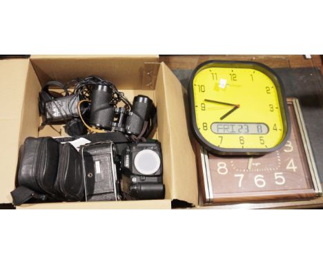 Seiko faux wood wall clock, a Life Max wall clock, a Nikon N80 camera, a pair of Kowa binoculars&nbsp;and further cameras and