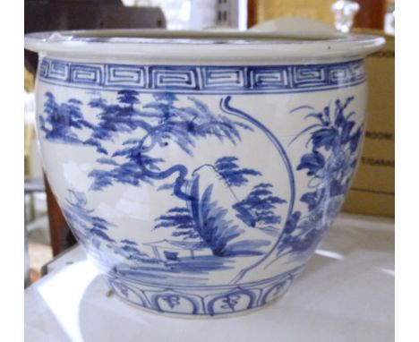 Italian ceramic basket of lemons, a large blue and white stick stand, a blue and white jardiniere&nbsp;of squat baluster form