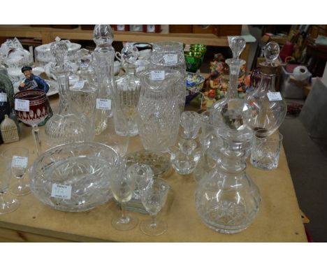 A collection of glass ware including decanter with silver collar decanters and vases