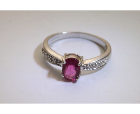 A 9ct White Gold ring inset with Ruby 