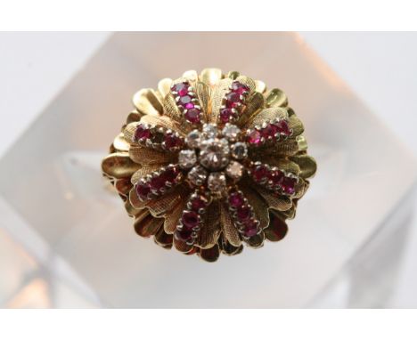 An 18ct gold ruby and diamond 1930s style cocktail ring