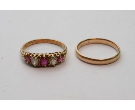 A diamond and ruby ring, unmarked band and an unmarked wedding band