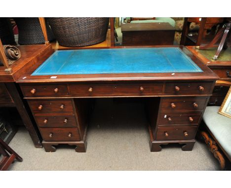 A Victorian mahogany pedestal desk the rectangular top above 9 drawers on bracket feet