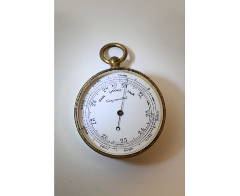 A gilt metal compensated pocket barometer
