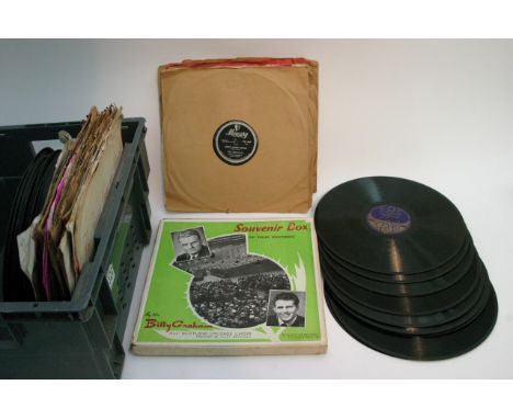 A box of 78rpm records and a record player (Phillips) in a wooden case