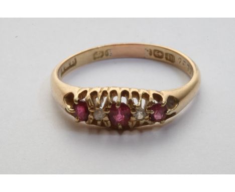 An 18ct gold ruby and diamond set ring