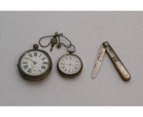 A silver cased button wind pocket watch plus one other and a silver and mother of pearl fruit knife (3).