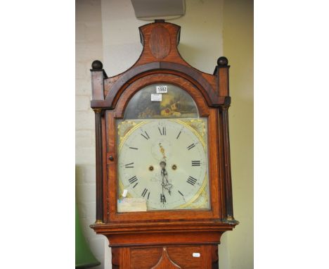 A mid 19th oak longcase clock with eight day painted dial