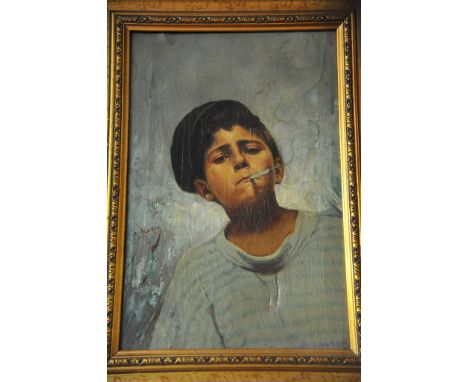 A gilt framed oil on canvas depicting portrait of boy smoking (40cm x 25cm)